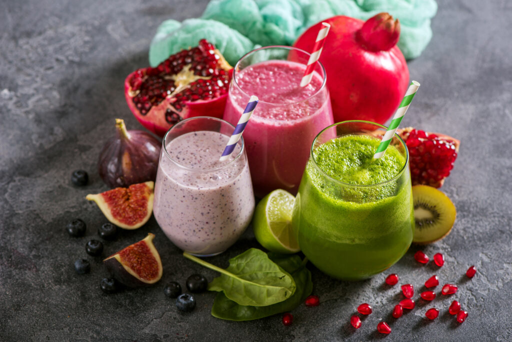 assortment of 3 different colored smoothies
